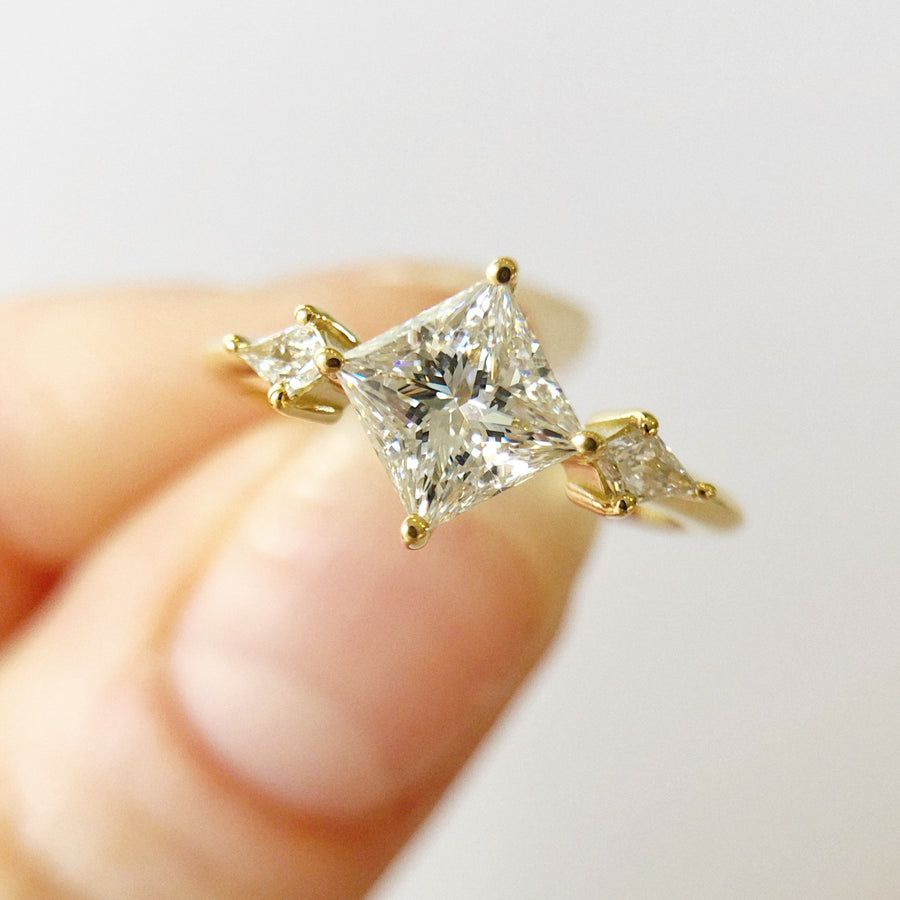 Diagonal princess cut engagement ring deals