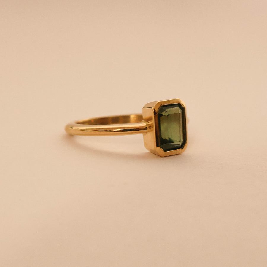 Emerald Cut Sapphire Bezel Solitaire