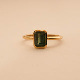 Emerald Cut Sapphire Bezel Solitaire