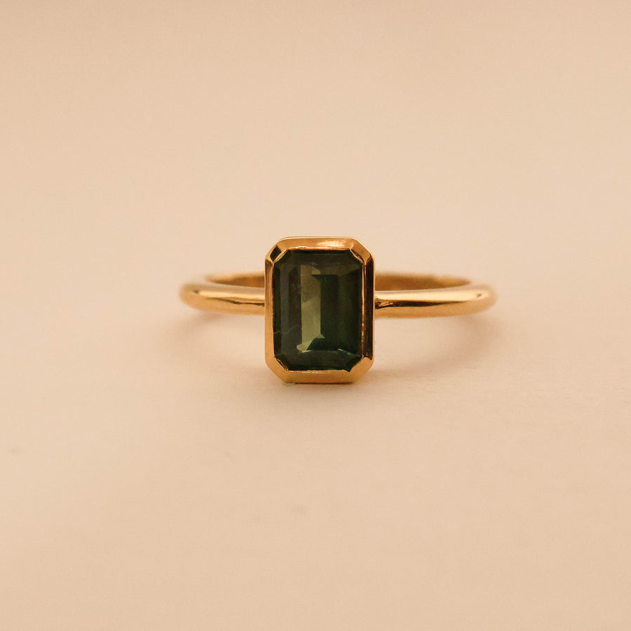 Emerald Cut Sapphire Bezel Solitaire