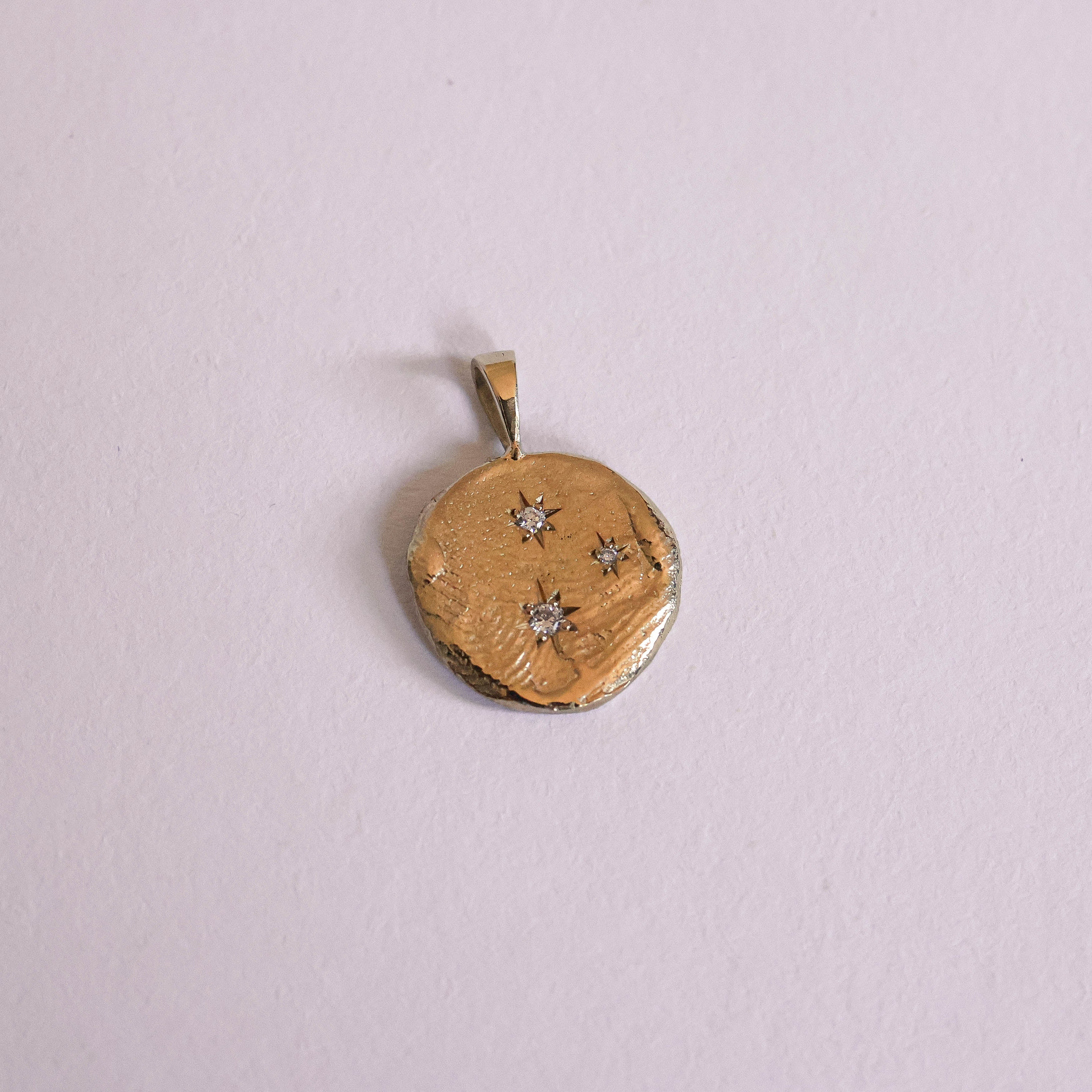 Infinite Currency Pendants